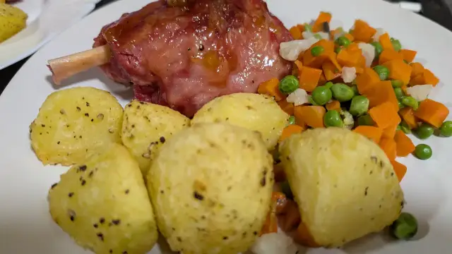 Slow roasted ham hock, roast potatoes and mixed veg