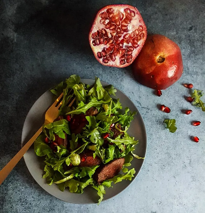 Pomegranate steak salad