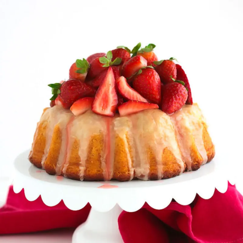 Glazed Vanilla Bean Bundt Cake {with macerated strawberries}