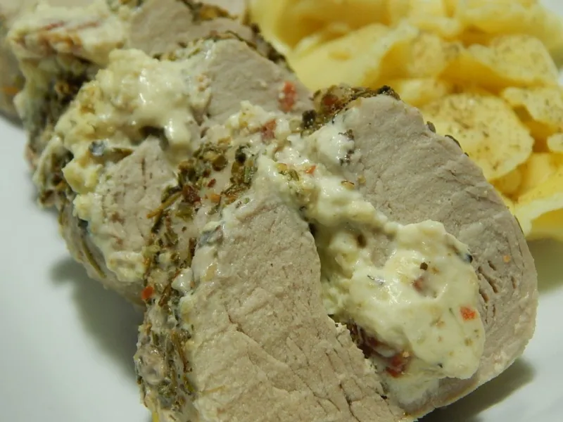 Herb & garlic cream cheese and bacon stuffed pork tenderloin