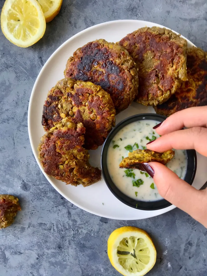 Vegan lentil patties with yogurt dip