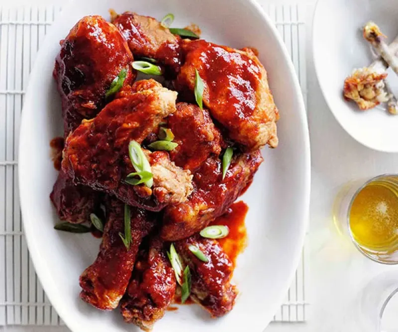 Korean fried chicken with chilli sauce and daikon kimchi