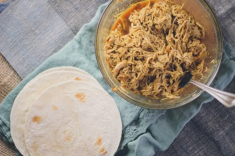 Juicy Pulled Chicken Tacos with Charred Jalapeños & Caramelized Onions