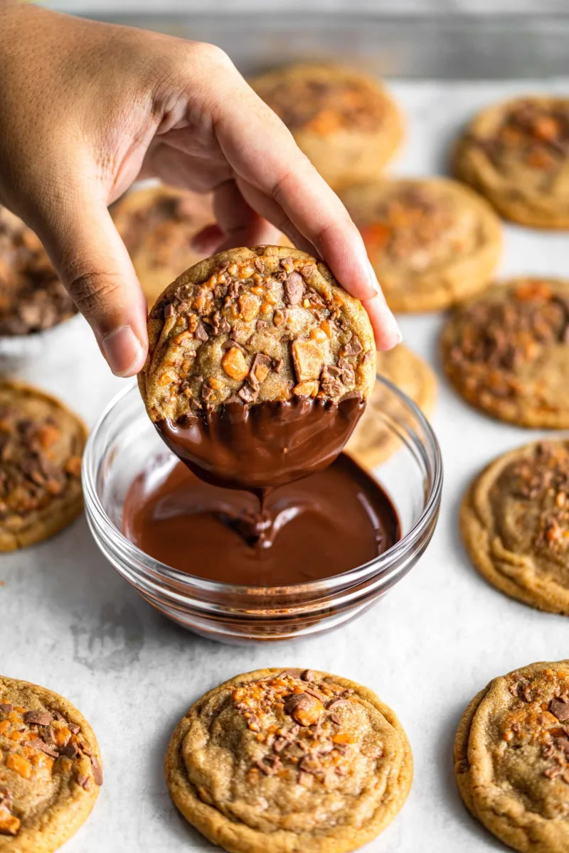 Chocolate-Dipped Peanut Butter Butterfinger Cookies