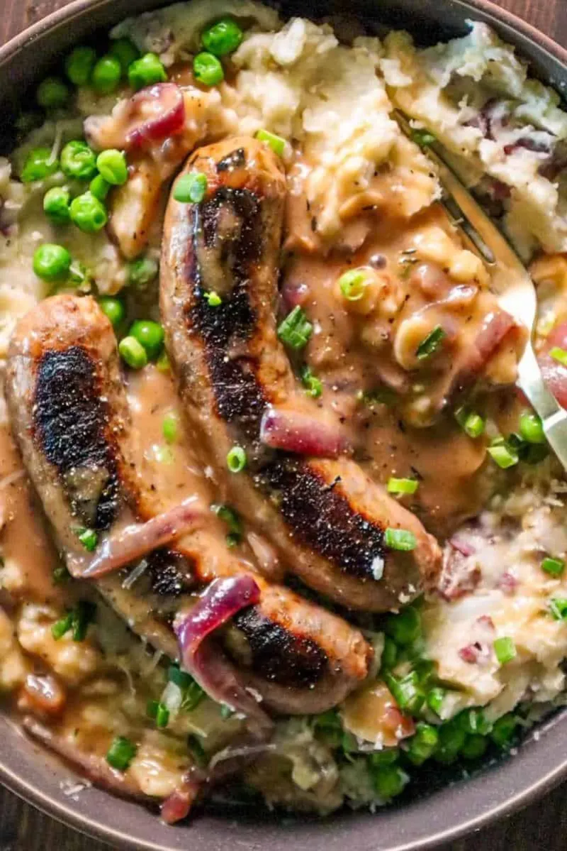 Bangers & White Cheddar Mash with Garlic Onion Gravy