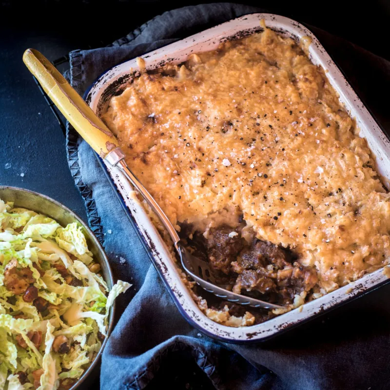 Potato-Top Guinness Pie with Savoy Cabbage, Bacon and Hazelnuts