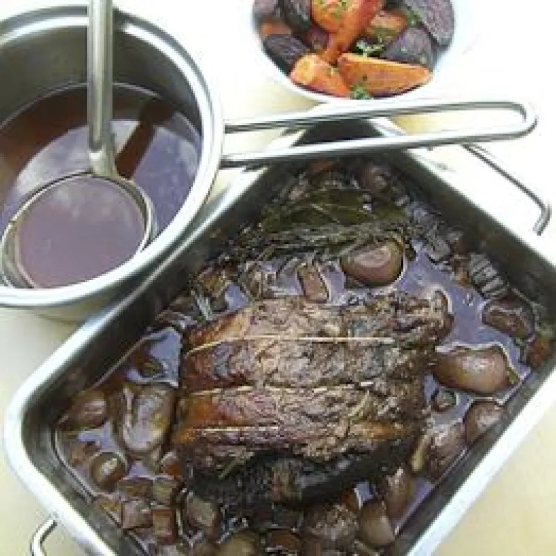 Pot roasted rolled rib of beef (leg of mutton cut)