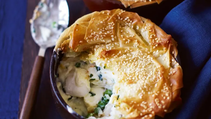 'Skinny' fish, pea and parsley pies with sesame pastry 