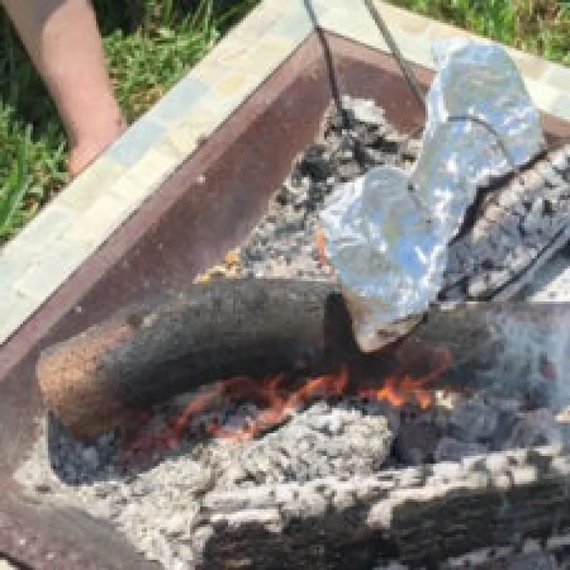 How to Pop Popcorn Over a Campfire