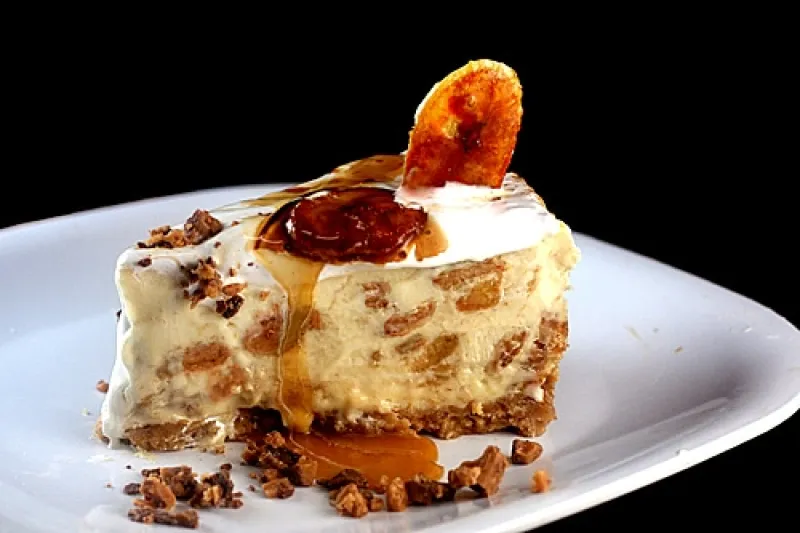 Caramelized Banana Pudding Cheesecake with Salted Cashew Praline - Vanilla Wafer Crust