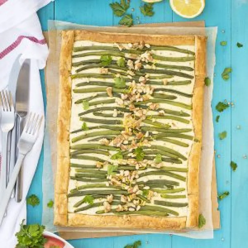Savory puff pastry tart with feta and green beans