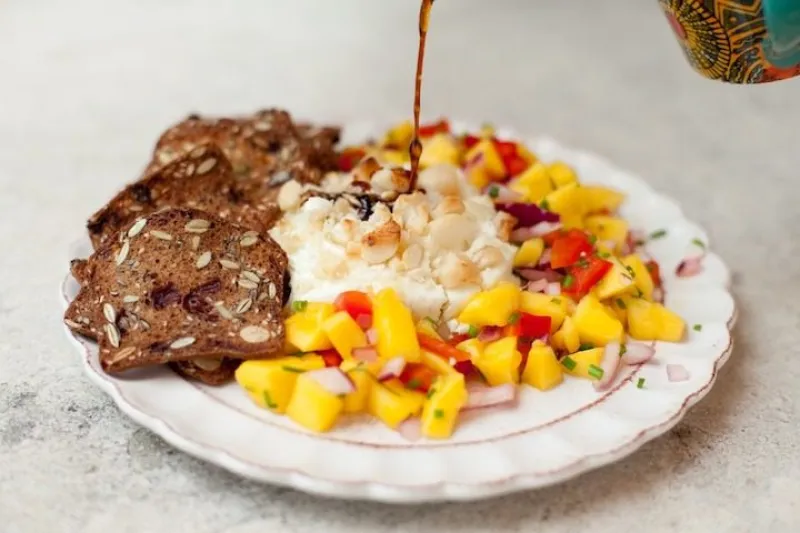 Warm Macadamia Nut Crusted Goat Cheese with Mango Chutney!