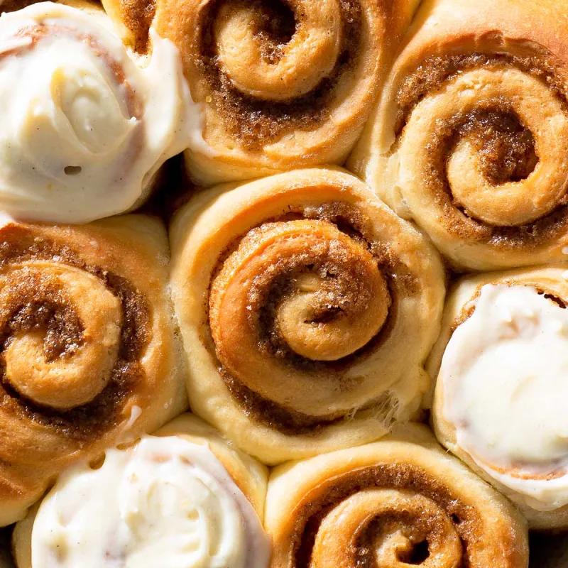 Cinnamon Rolls with Apricot Cardamom Cream Cheese Frosting